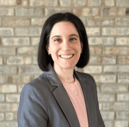 Woman smiling for the camera for a headshot - Applied CAx Siemens software