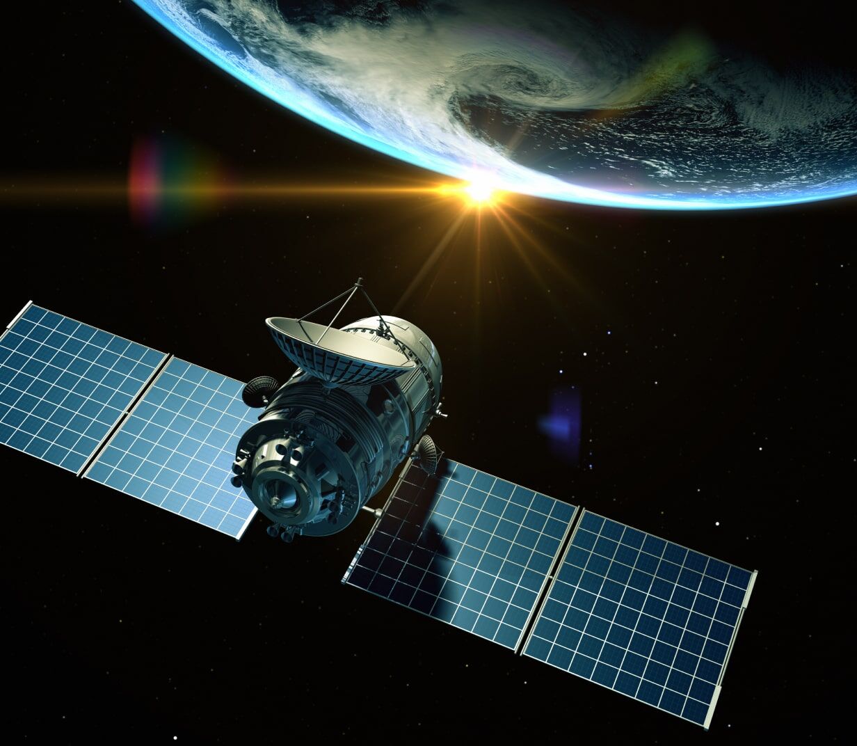 Satellite orbiting in space around earth with the sun in view - Applied CAx Siemens software partner USA