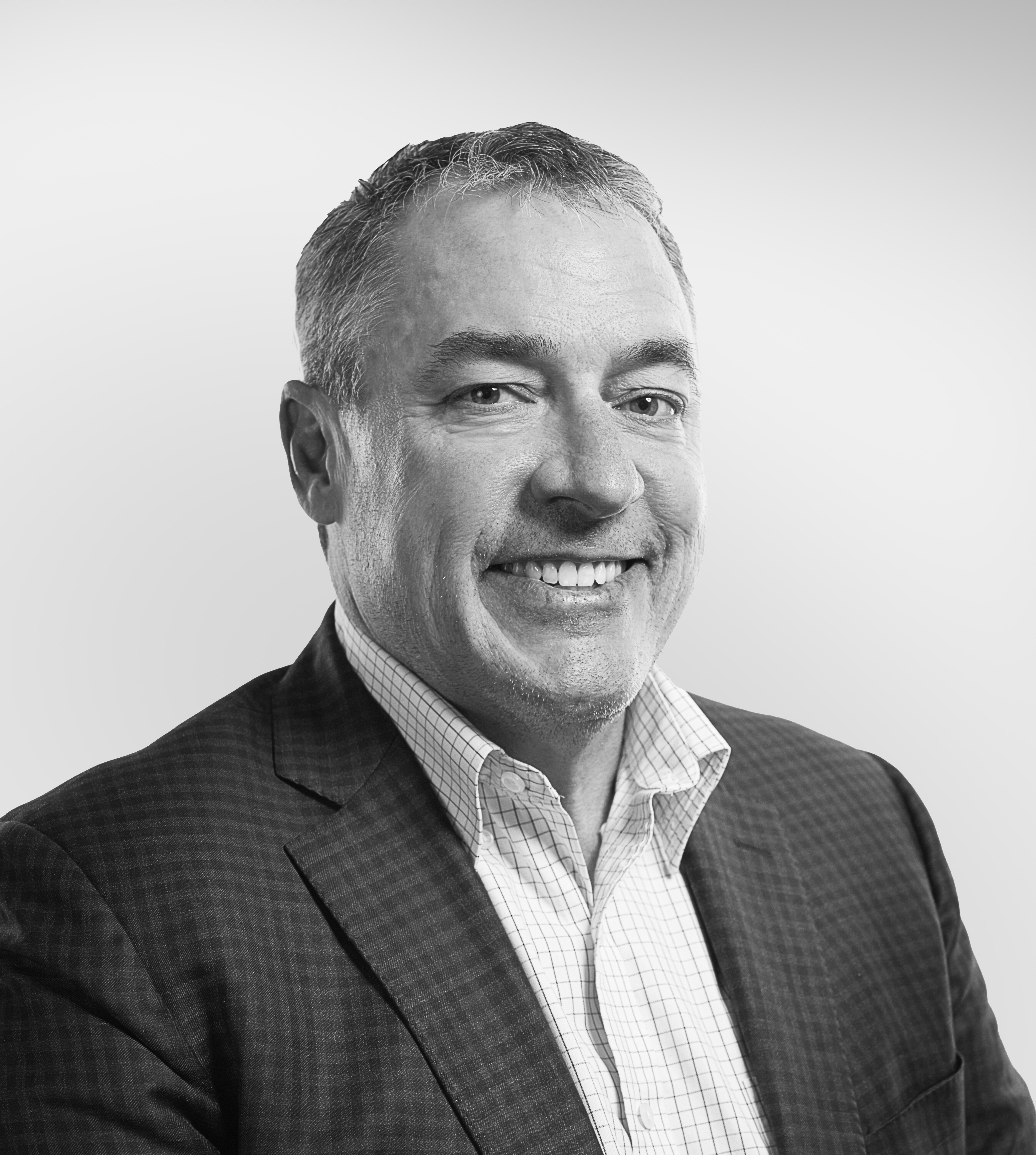 Man smiling at the camera for a headshot - Applied CAx Siemens software partner USA