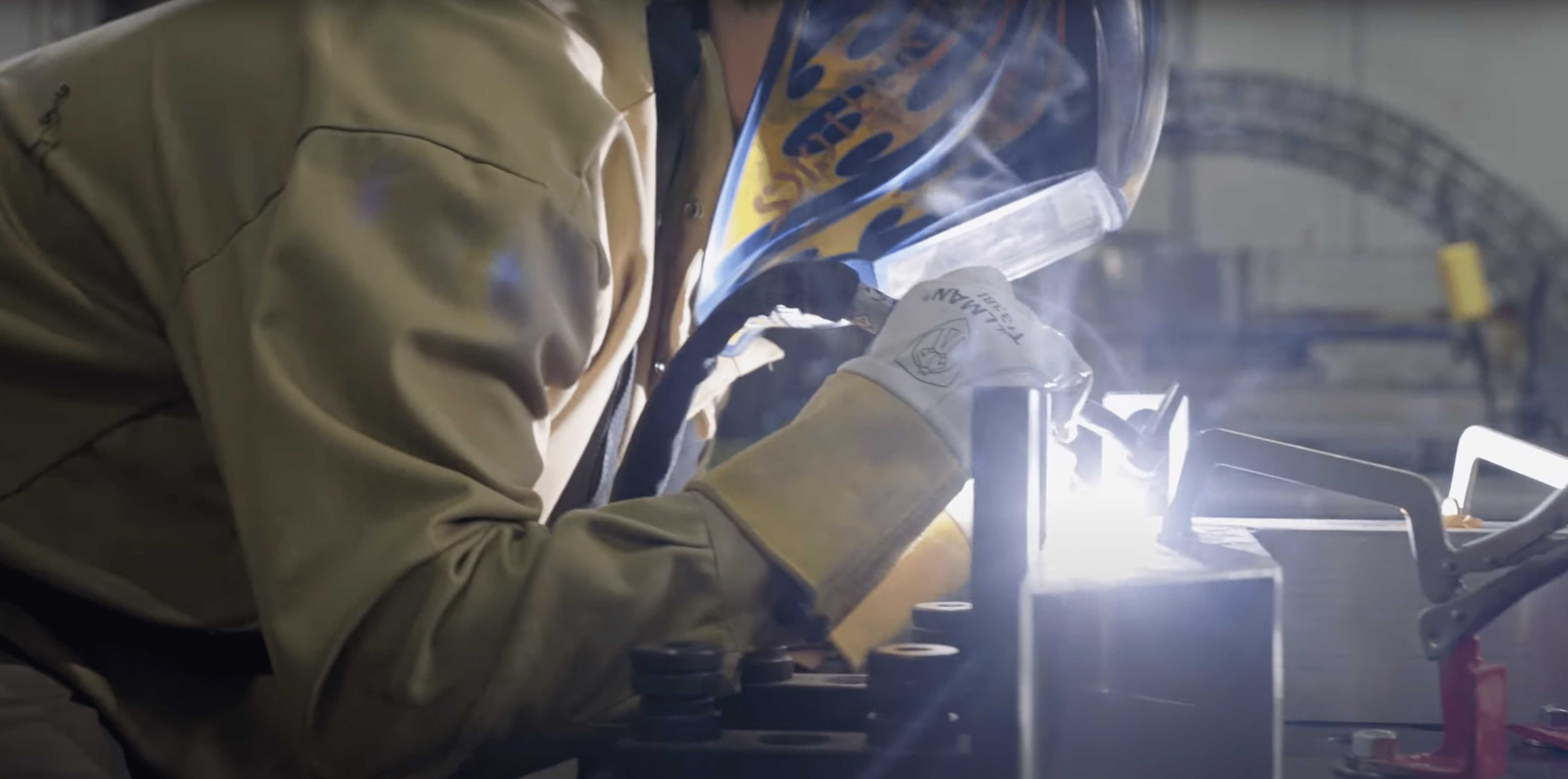 man welding - Applied CAx Siemens software partner USA