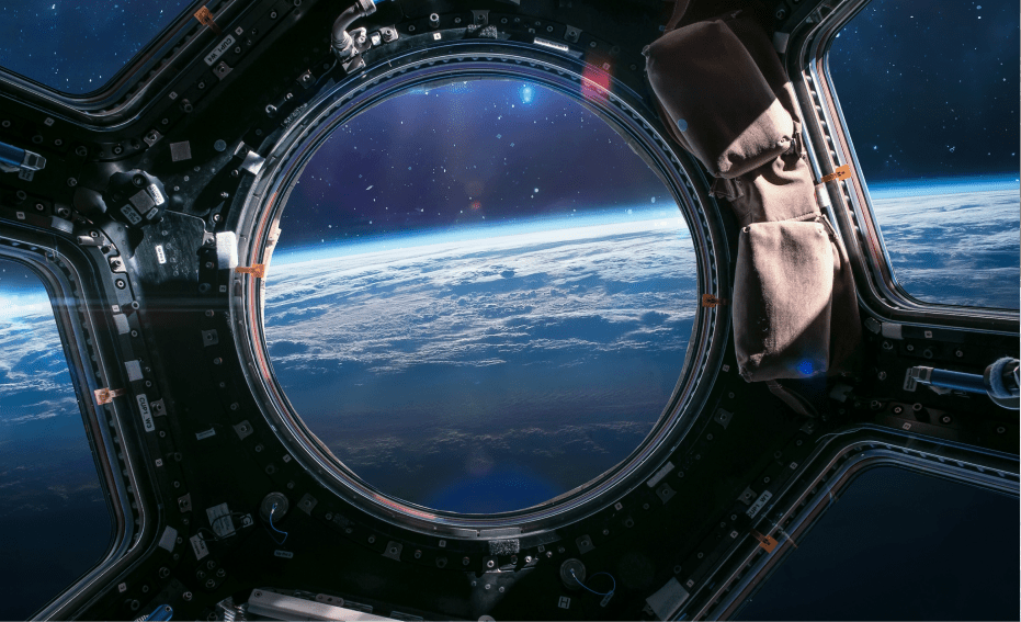 Circular window looking into space with Earth in the background - Applied CAx Siemens software partner USA